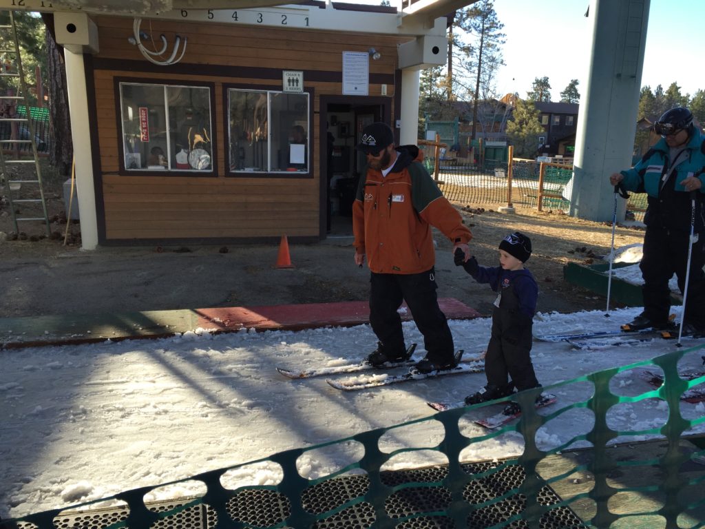 Landon & Ski Instructor JD on their way to the ski lift