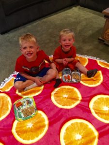 Landon & Liam picnicing inside